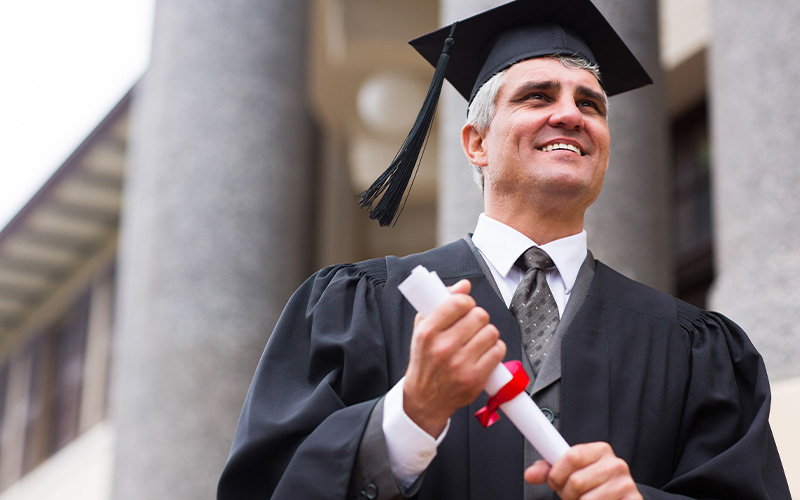 graduation cap symbol representing education achievement with reference to 15 graduates